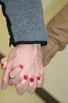 Lovers hold hands